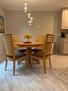 Dining area with expandable table for seating