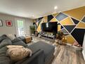 Spacious living room with 75" TV and oversize