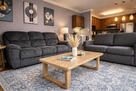 Living Room with motorized reclining couch an
