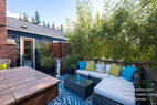 French doors open to this deck with bamboo vi