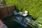 A secluded space surrounded by mature greener