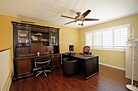 Full office with PC workstation and dark wood