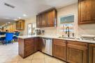 Kitchen has view to the pool