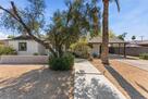 Paved concrete entrance for an elevated feel