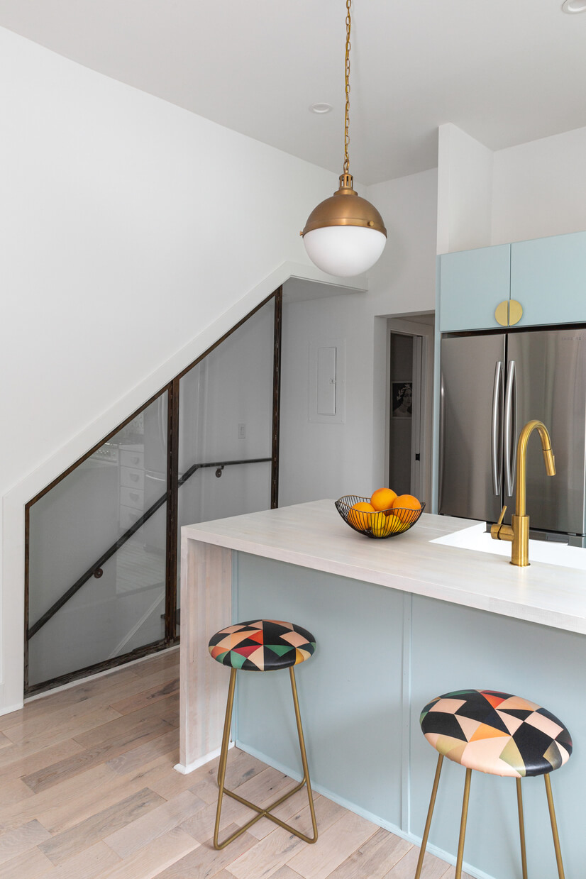 Bar-seating kitchen with modern white tones