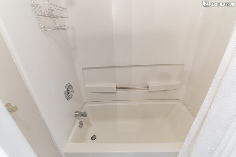Top floor bath features shower/tub combo