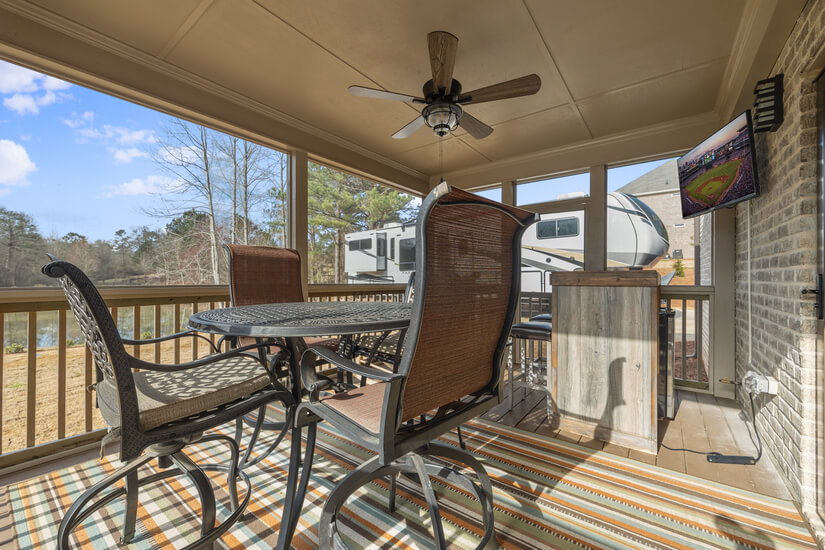 Entertain on a spacious screened-in deck.