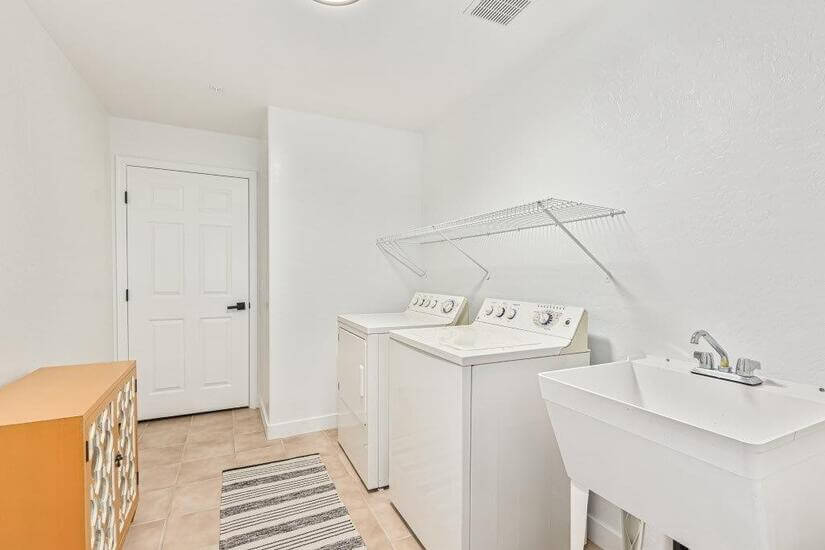 Cavernous Laundry room and storage room
