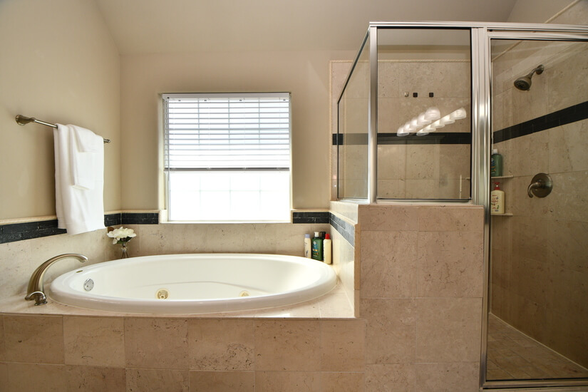 Jetted bath tub and separate shower