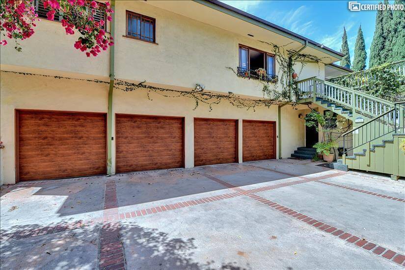 Courtyard garages and stairs to unit