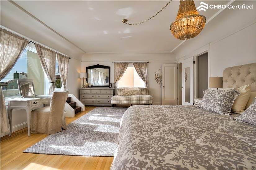 view of queen bedroom full view