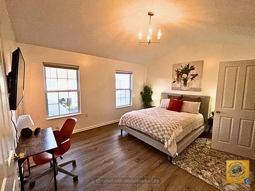 Bedroom 1 with en-suite bath and walk-in closet