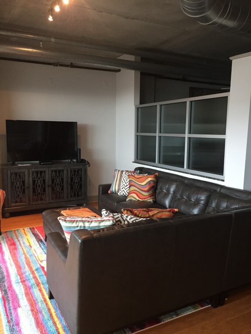 Leather Sectional in Living room by balcony