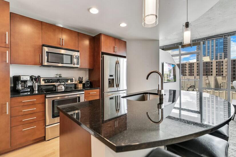 25th Floor Spire Condo Plus Den