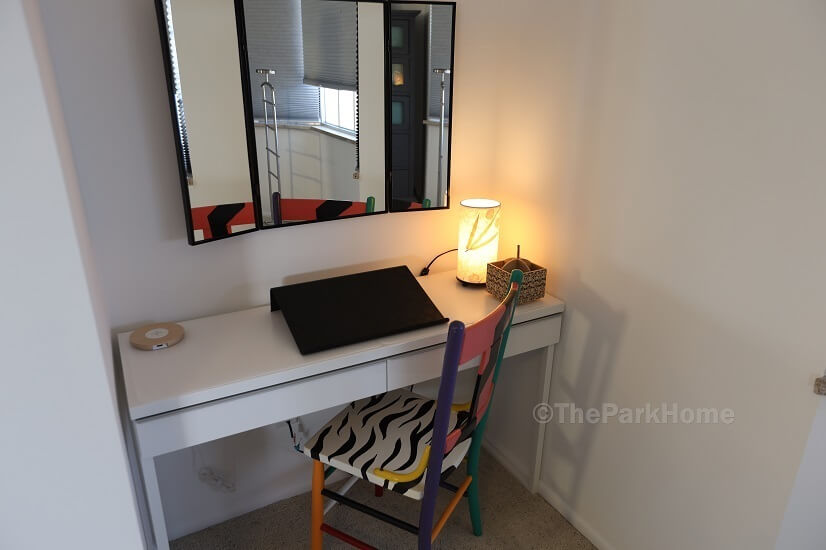 Versatile work or dressing space in your primary bedroom.