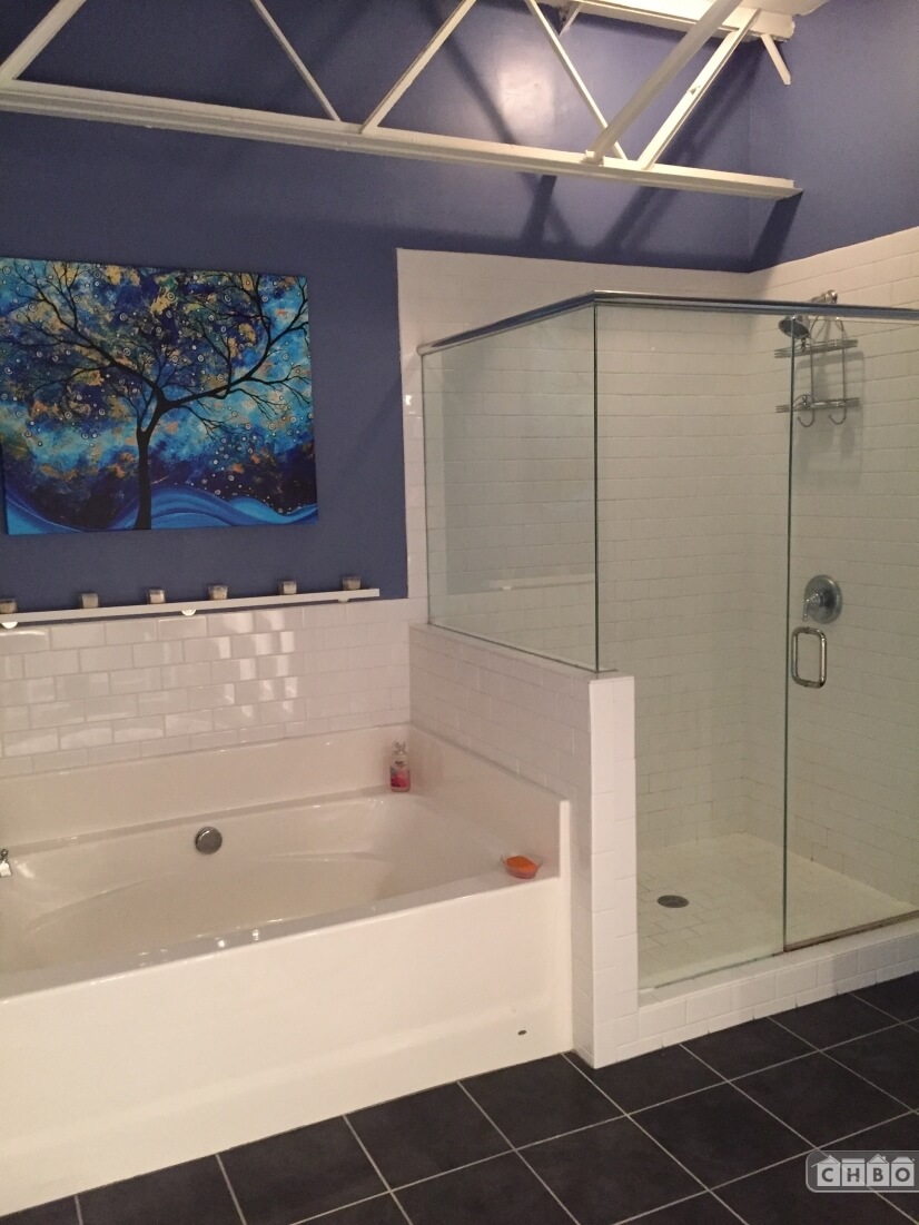 Master Bath w glass enclosed shower and soake