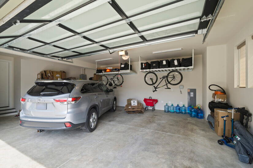 Oversized 2 car garage with overhead racks