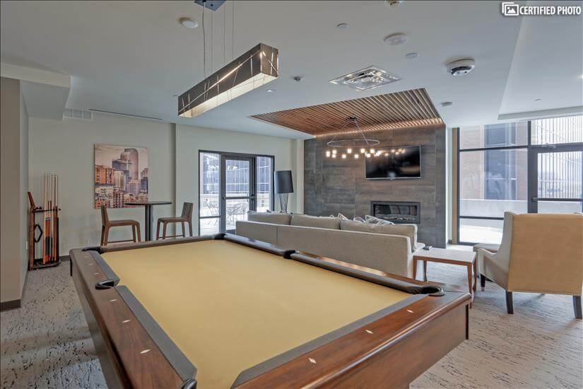 Community room with shuffle board, pool table