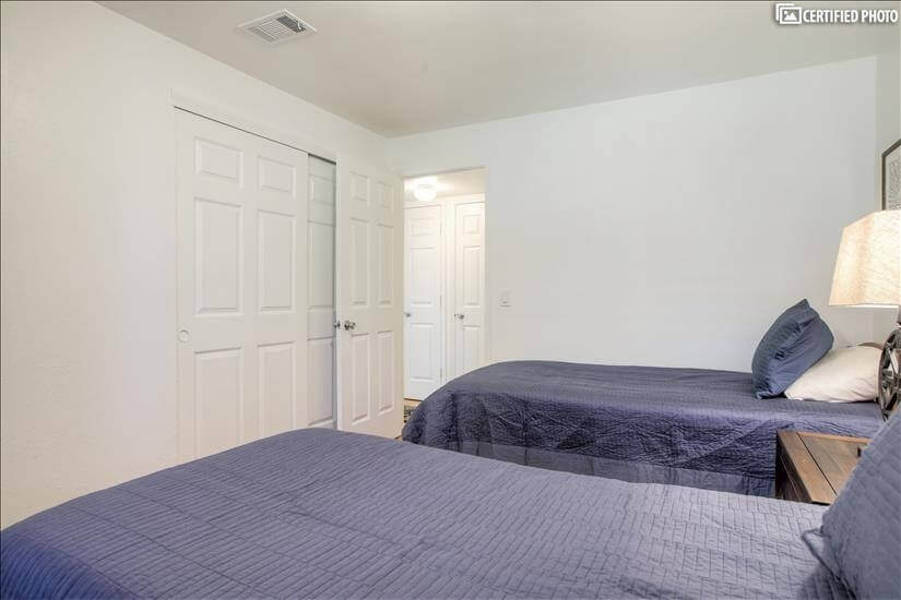 Large 2nd bedroom with a great deal of closet