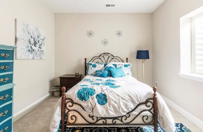 Bedroom 2 shows space, older linen design