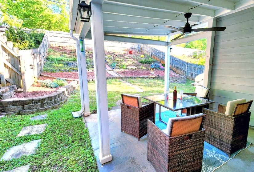 An inviting backyard with an exotic garden.
