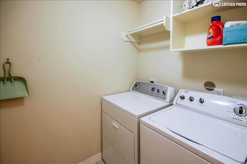 Walk in laundry with washer & dryer