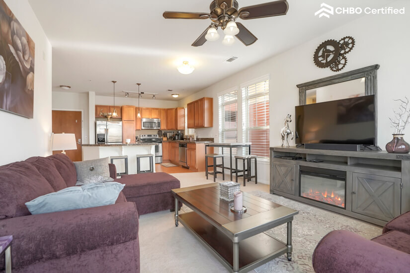 Look at your beautiful living space, even has a fireplace!