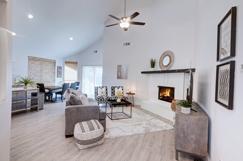 Fully furnished living room with fireplace