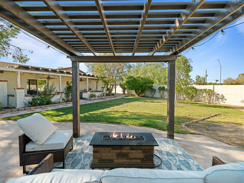 Outdoor pergola with fireplace