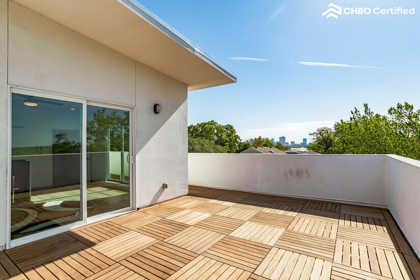 Rooftop wooden deck. View of Dickies Area