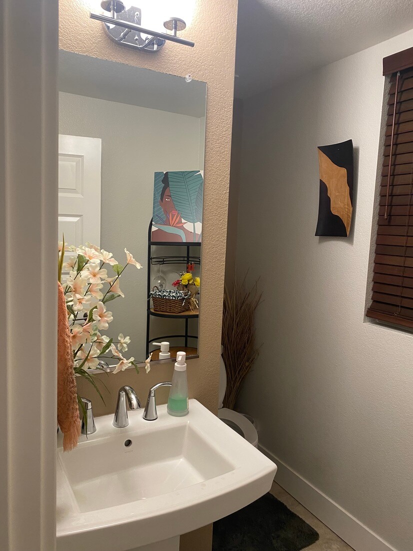 View of half bath downstairs.