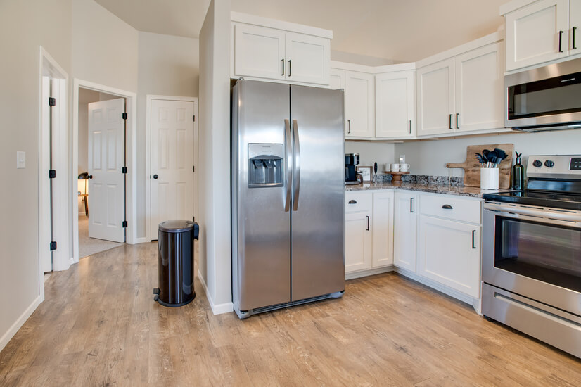 Kitchen: Full-Size Fridge - Granite Countertops