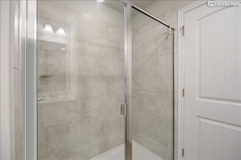 Large shower in master bathroom.