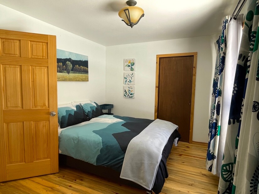 Main level bedroom 2 with 1 queen and 1 twin