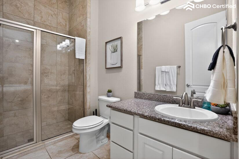 Bright bathroom with storage vanity