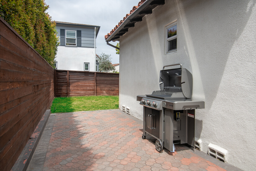 Grill space and grass side yard, fully fenced