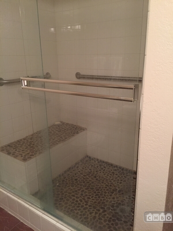 Shower with seat and grab bars