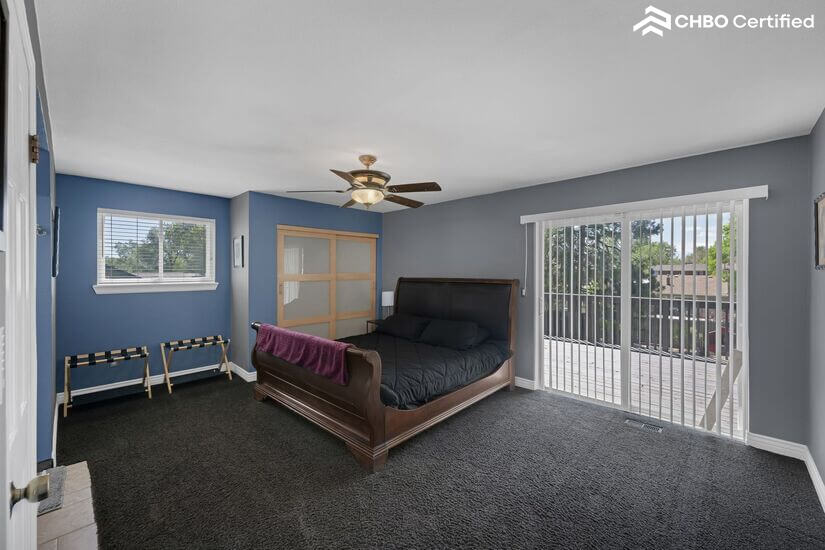 King bed master with exit to deck and stairs to hot tub