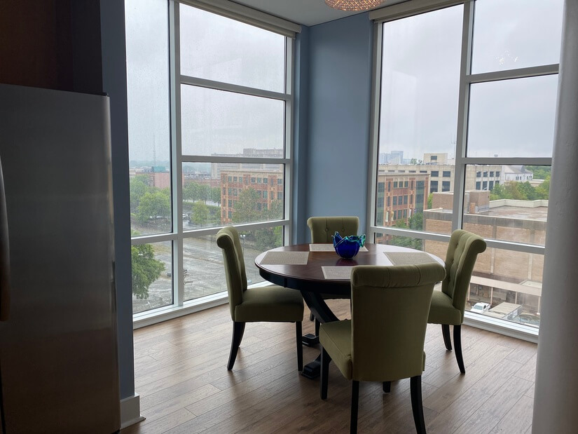 Formal dining room, floor to ceiling windows