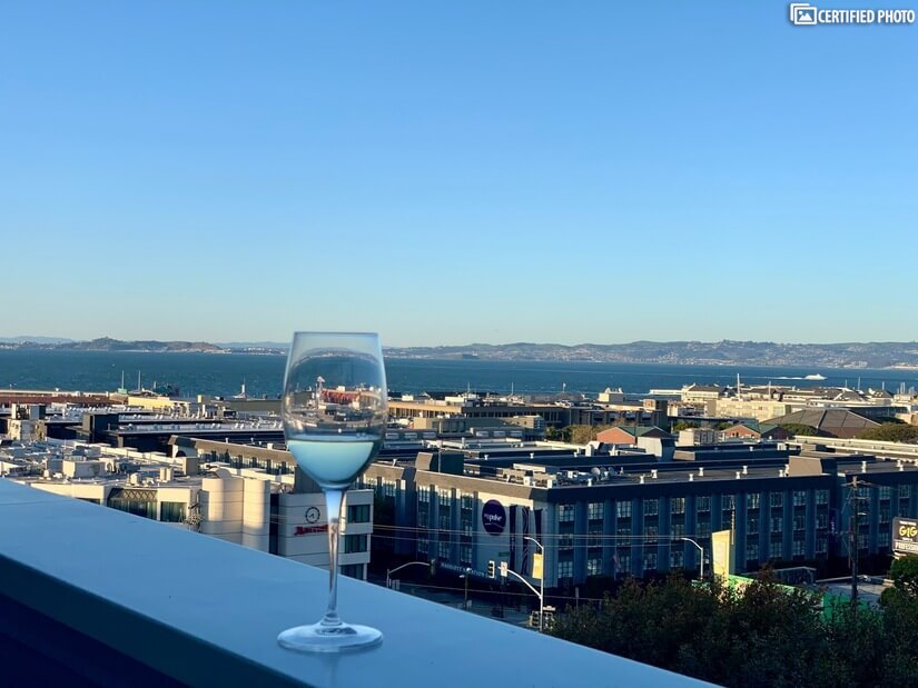 Enjoy a glass of wine on the balcony