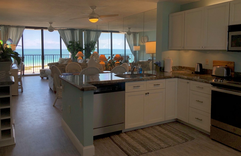 Large and open kitchen with a beachfront view