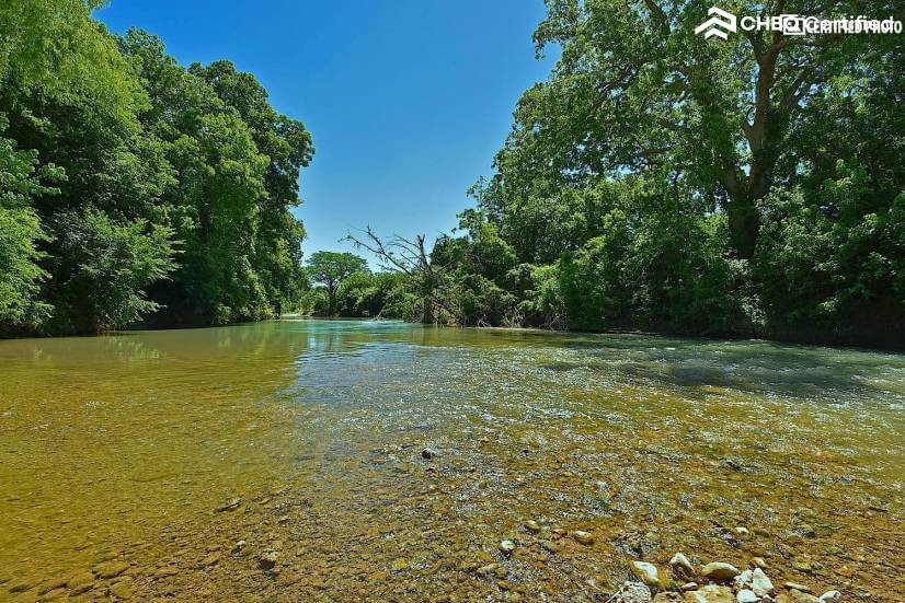 House is Located Along the San Marcos River