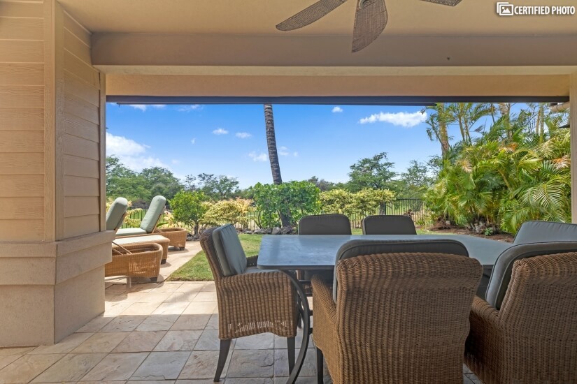 Covered lanai & backyard view from family room.