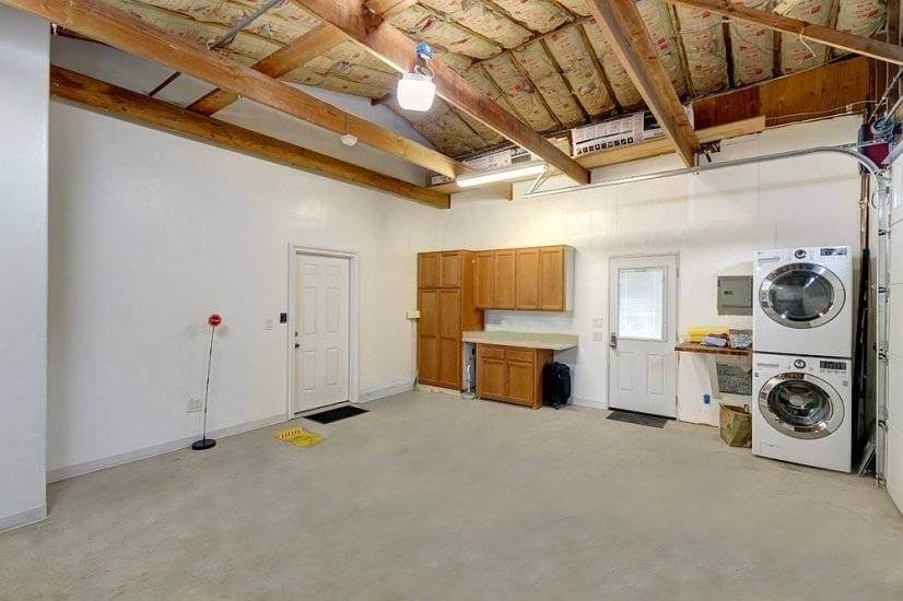 Garage with laundry faciltiy.  House is well