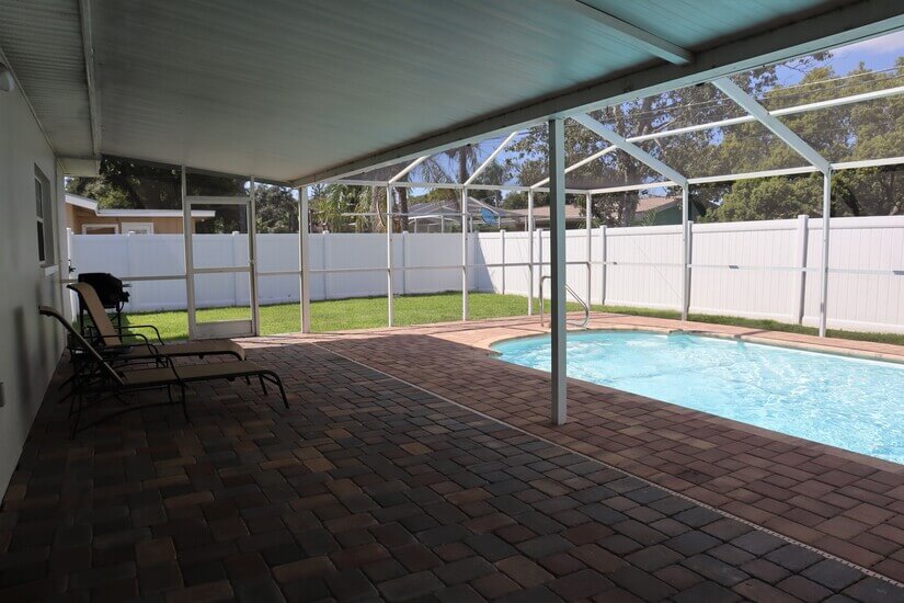 Covered patio and caged in pool