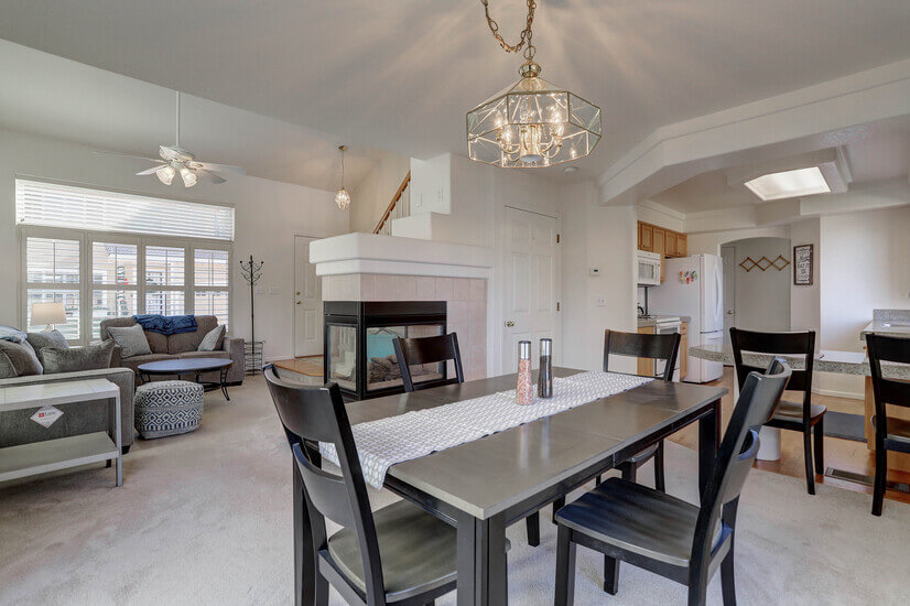 Main floor view 1 (living, dining, fireplace and kitchen)