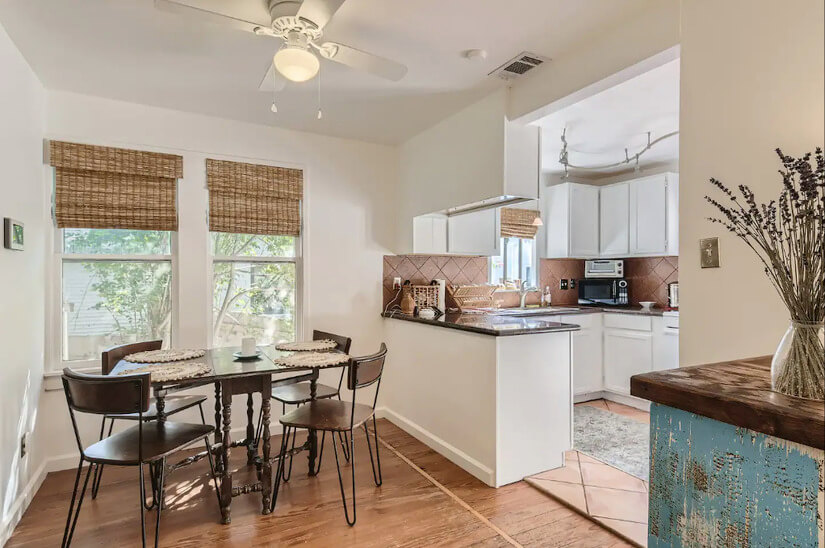 Open view of the full kitchen and dining room