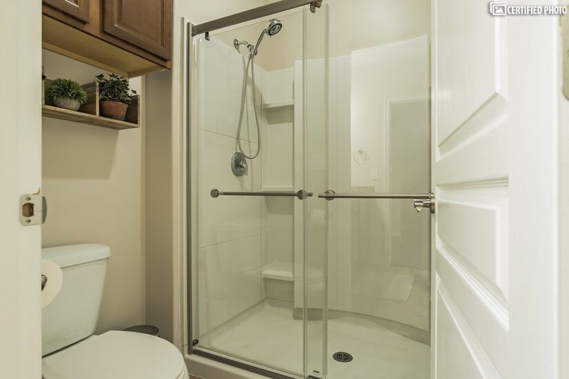 Private commode and European shower enclosure are great