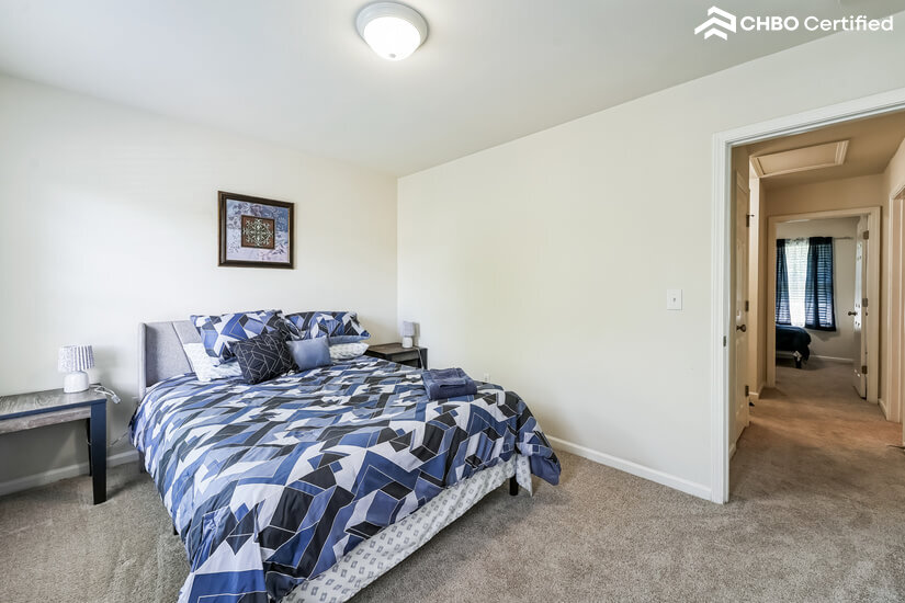 Secondary bedroom with queen bed,