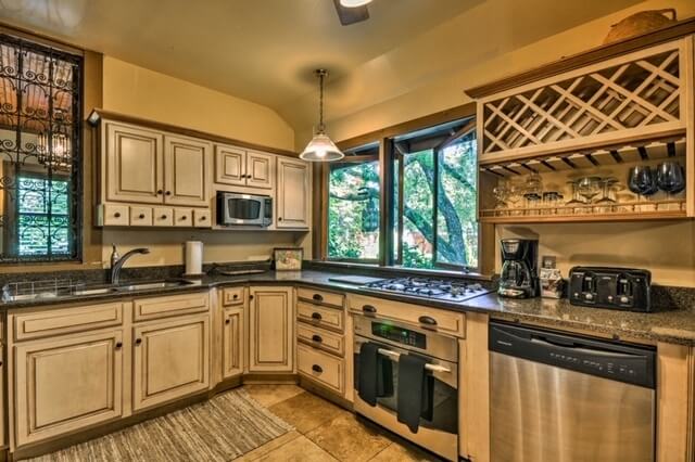 Gourmet kitchen with gorgeous views of the many gardens